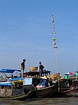 Im Mekong-Delta - Schwimmende Händler (Im Angebot: siehe Stange)